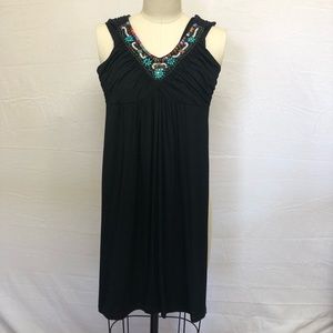 Black sleeveless top or short dress